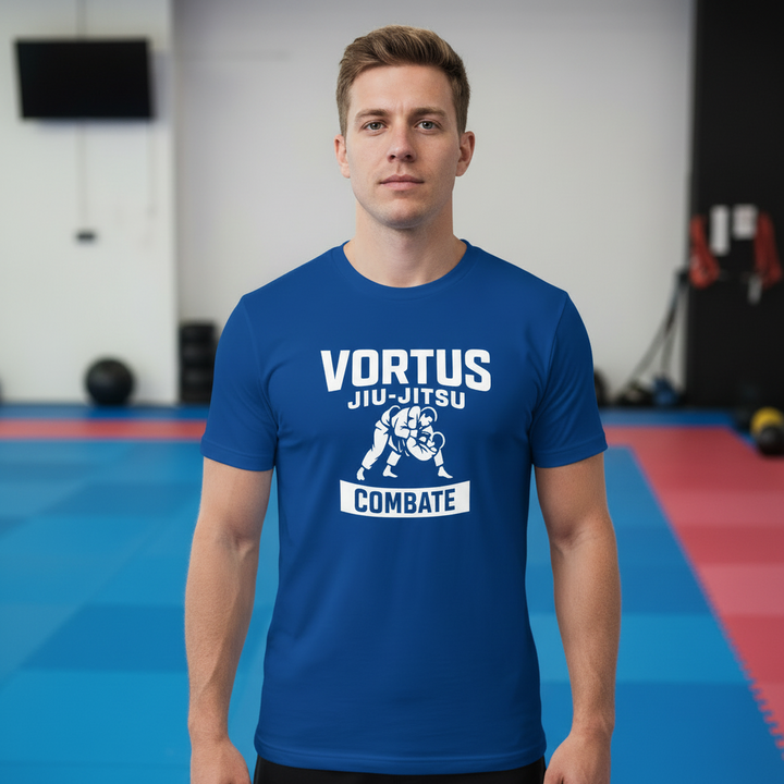 Royal blue 'Vortus Jiu-Jitsu shirt in a martial arts setting.